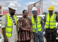 AFRO-ARAB PRESIDENT CUTS SOD FOR BLAKK RASTA 30-UNIT HOUSING PROJECT